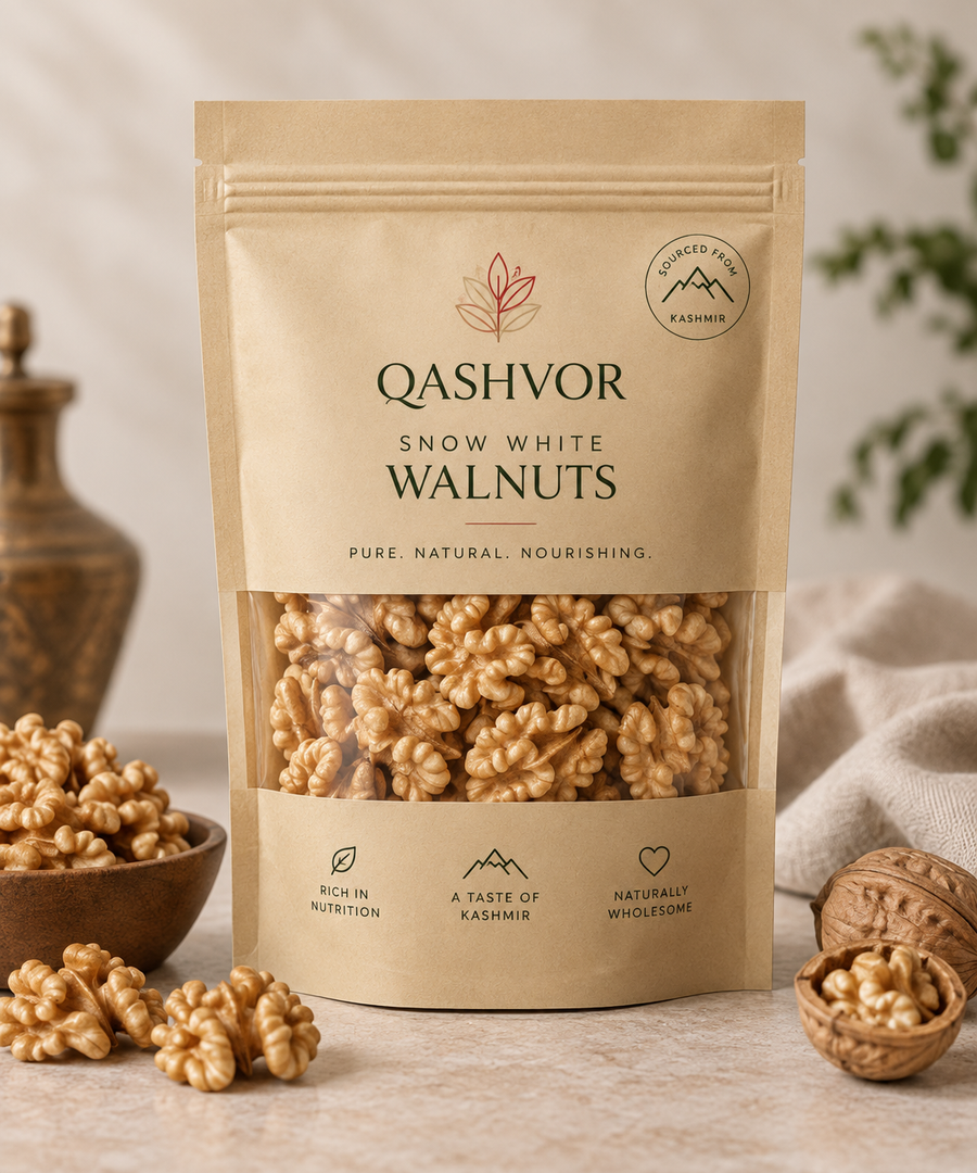 Qashvor Kashmiri walnuts in a kraft pouch with walnut kernels and whole walnuts